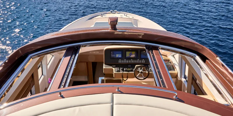 Slide: The Image of 2024 Solaris 57 Lobster yacht cockpit with ocean view and modern navigation system. - 6