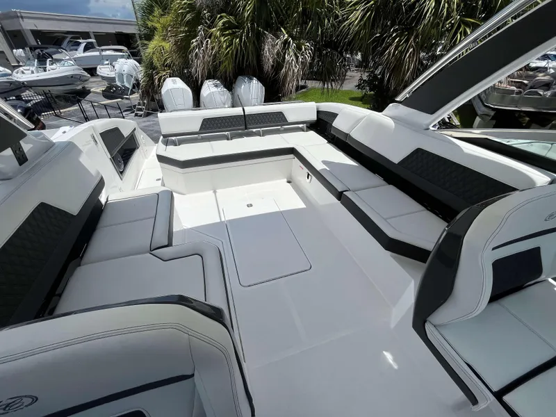 Slide: The Image of Luxurious seating area on 2023 Cobalt R33 boat, featuring sleek design and spacious layout. - 12