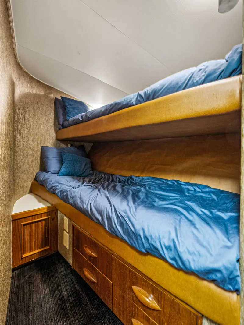 Slide: The Image of Bunk beds in the 1990 Buddy Davis 61 Convertible yacht cabin. - 24