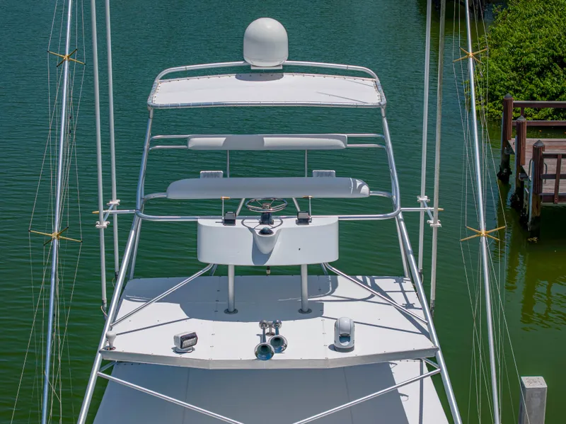 Slide: The Image of 1990 Buddy Davis 61 Convertible boat tower with radar and antennas. - 4