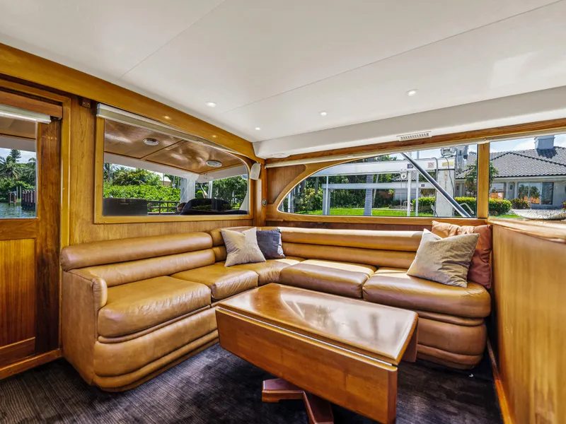 Slide: The Image of Luxurious interior of a 1990 Buddy Davis 61 Convertible yacht with leather seating. - 7
