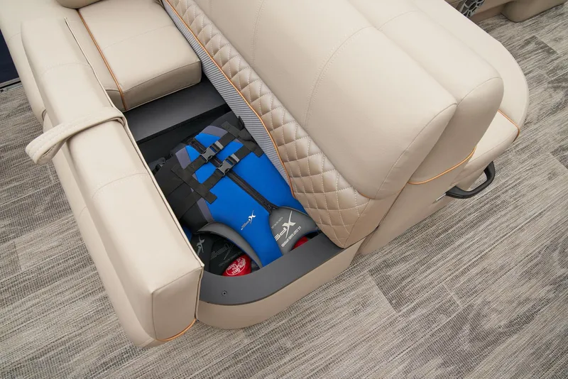 Slide: The Image of 2024 Ranger Reata 220F boat with under-seat storage containing life jackets. - 46