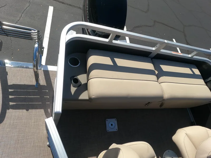 Slide: The Image of 2024 Sun Tracker Fishin' Barge 22 XP3 interior seating and cup holders. - 11