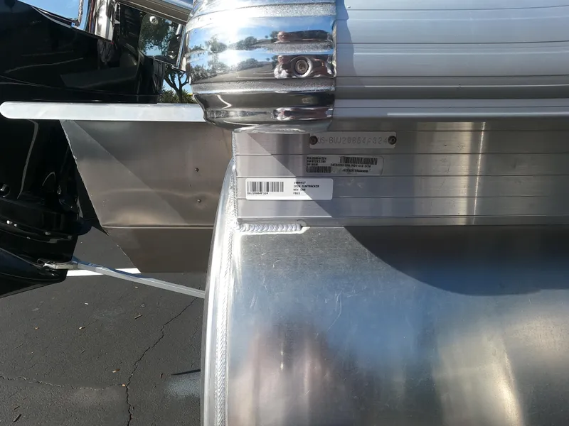 Slide: The Image of Close-up of 2024 Sun Tracker Fishin' Barge 22 XP3 pontoon boat's identification plate. - 2