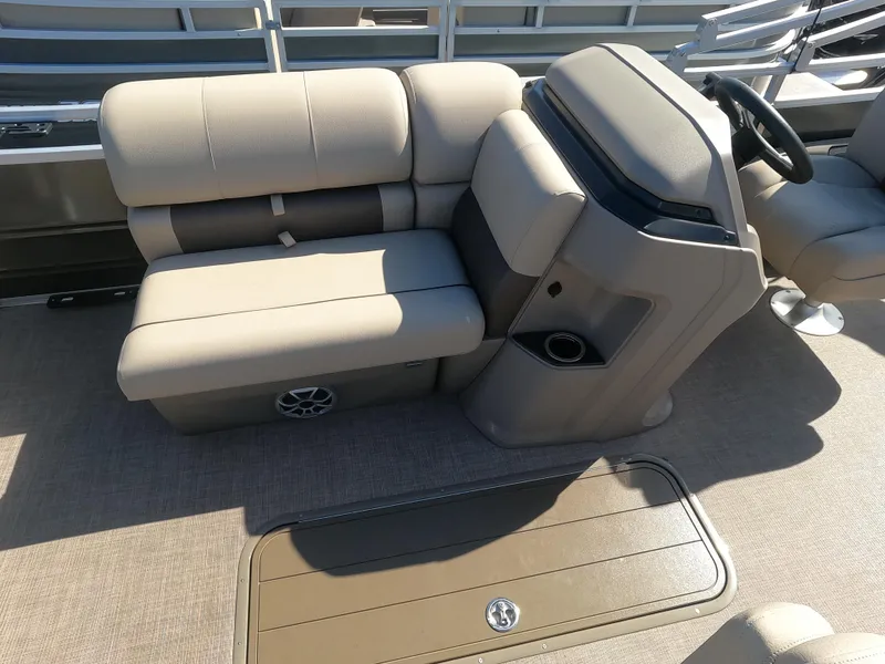 Slide: The Image of 2024 Sun Tracker Fishin' Barge 22 XP3 interior seating and console area. - 5