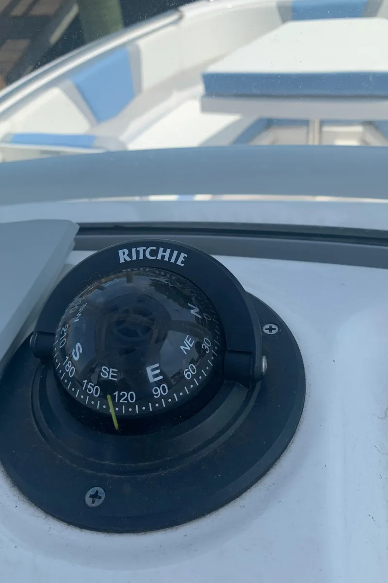 Slide: The Image of Ritchie compass on 2022 Robalo R230 boat dashboard. - 15