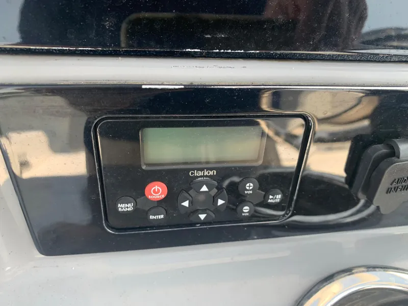 Slide: The Image of Clarion audio control panel on a 2022 Robalo R230 boat. - 9