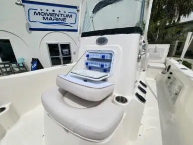 Slide: The Image of 2023 Sundance DX20 boat at Momentum Marine dealership. - 12