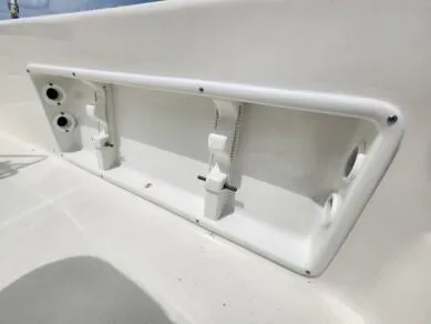 Slide: The Image of 2023 Sundance DX20 boat interior storage compartment. - 5