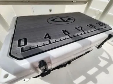 Slide: The Image of 2023 Sundance DX20 boat with integrated fish measuring ruler. - 8