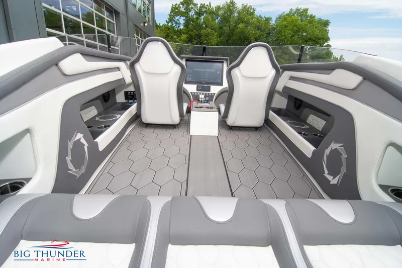 Slide: The Image of 2023 Fountain 34 Thunder Cat interior with modern seating and advanced dashboard. - 15
