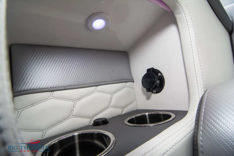 Slide: The Image of 2023 Fountain 34 Thunder Cat interior with cup holders and LED light. - 17