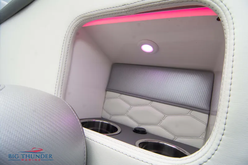 Slide: The Image of Interior of 2023 Fountain 34 Thunder Cat with cup holders and LED lighting. - 18