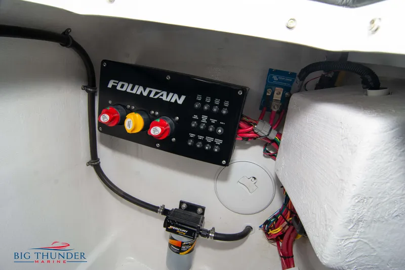 Slide: The Image of 2023 Fountain 34 Thunder Cat control panel and wiring in boat interior. - 32