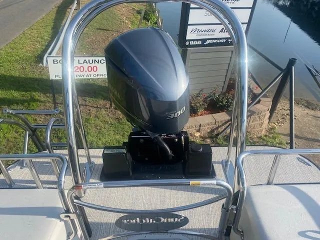 Slide: The Image of 2023 SunCatcher Elite 326 SS boat with 300 HP engine at dock. - 9