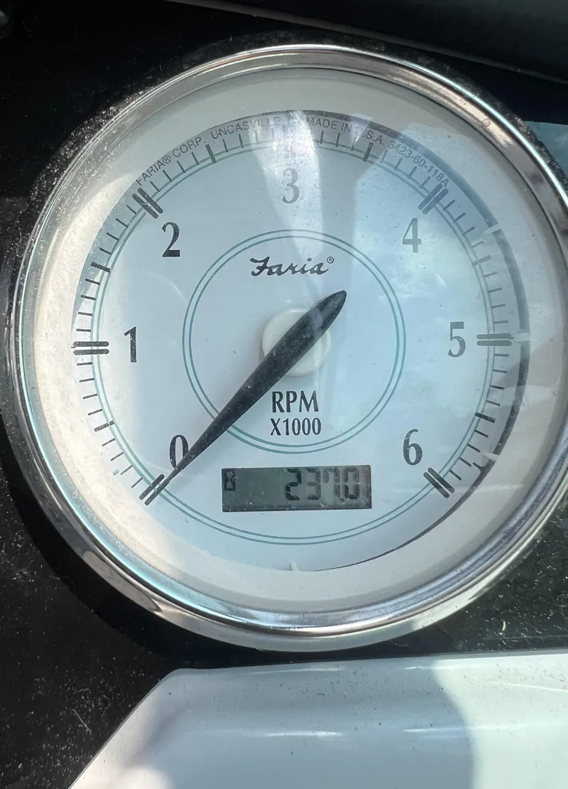 Slide: The Image of Close-up of a 2019 Regal 28 Express tachometer showing 2370 RPM. - 29