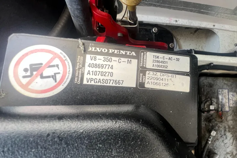 Slide: The Image of Close-up of a Volvo Penta engine label on a 2019 Regal 28 Express boat. - 47