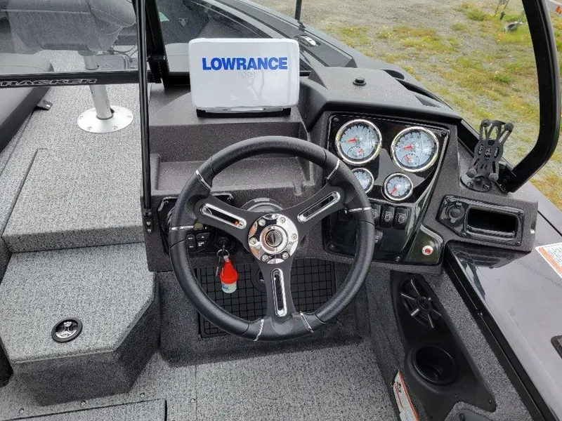 Slide: The Image of 2024 Tracker Targa V19 Combo boat dashboard with Lowrance electronics. - 3
