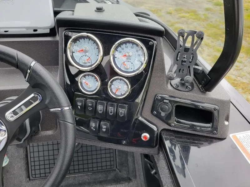 Slide: The Image of 2024 Tracker Targa V19 Combo dashboard with gauges and controls. - 8