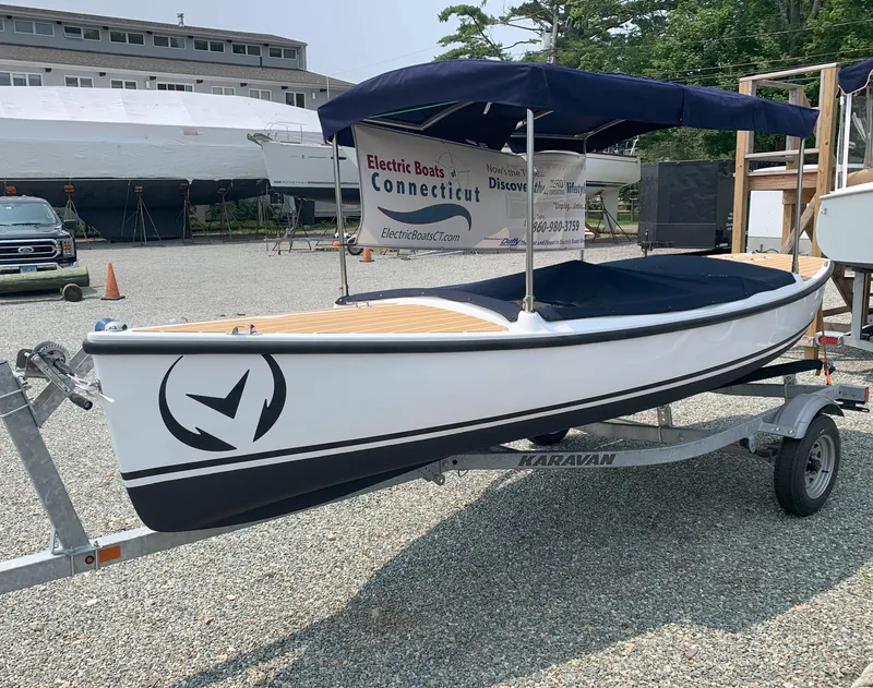Slide: The Image of 2023 Vision Marine Technologies Quietude 156 electric boat on a trailer. - 0