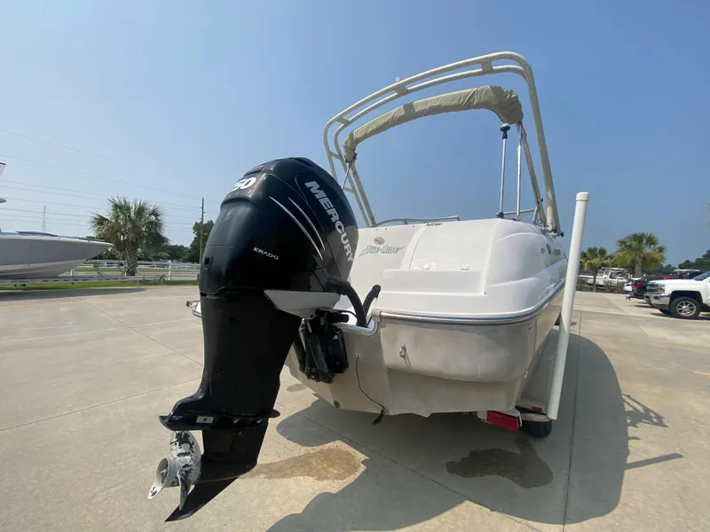Slide: The Image of 2009 Starcraft 2410 OB Limited boat with Mercury outboard motor. - 1