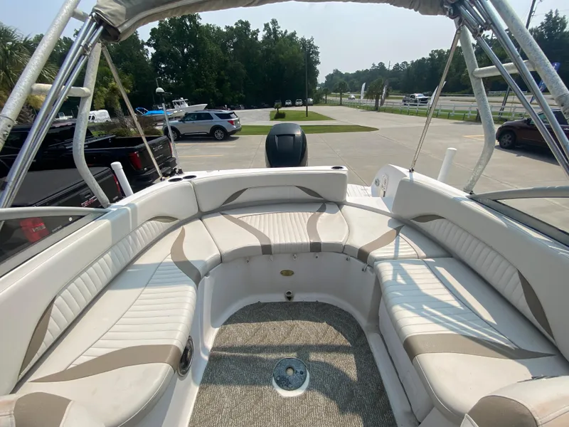 Slide: The Image of 2009 Starcraft 2410 OB Limited boat with spacious seating and modern design. - 7