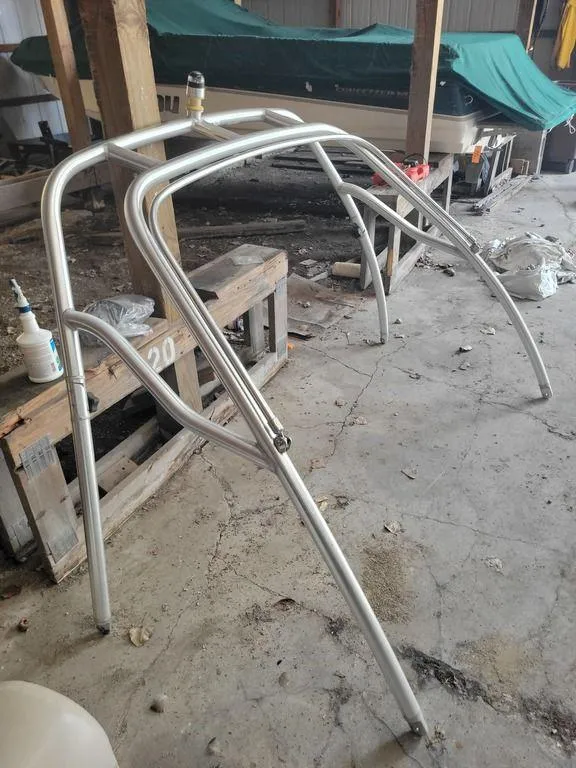 Slide: The Image of Aluminum wakeboard tower for 2011 Sea Ray 195 Sport in a storage area. - 13