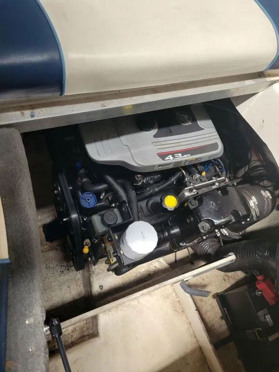 Slide: The Image of Engine compartment of a 2011 Sea Ray 195 Sport boat. - 16