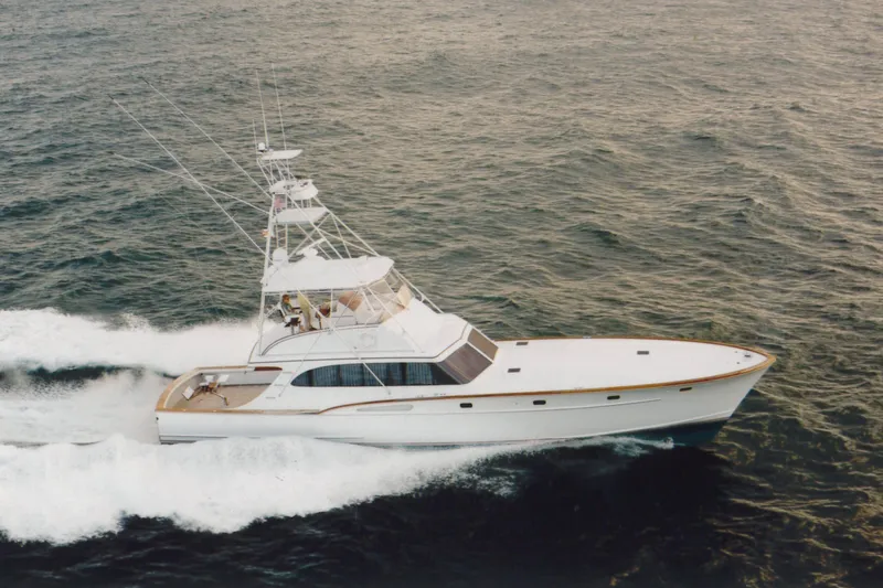 The Image of 2001 Rybovich Sportfisherman yacht cruising on open water. - 1