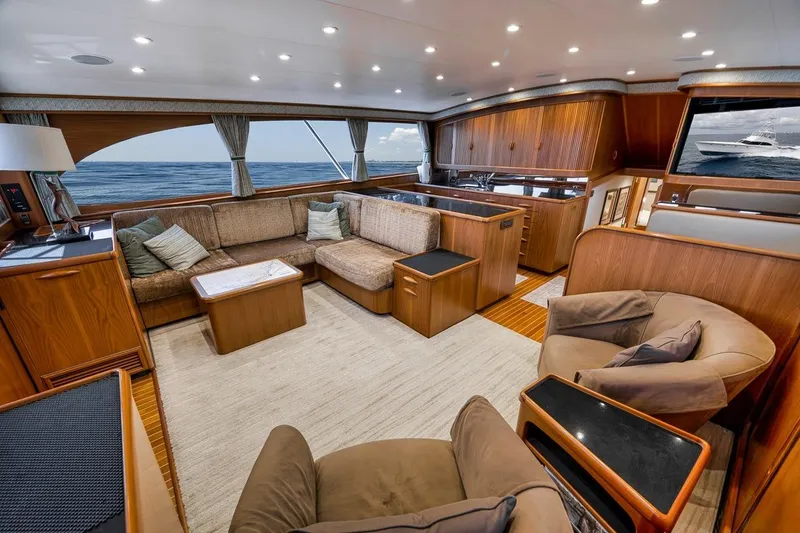 Slide: The Image of Luxurious interior of a 2001 Rybovich Sportfisherman yacht with elegant wood finishes. - 3