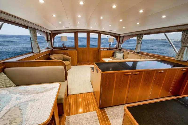 Slide: The Image of Luxurious interior of a 2001 Rybovich Sportfisherman yacht with elegant wood finishes. - 5