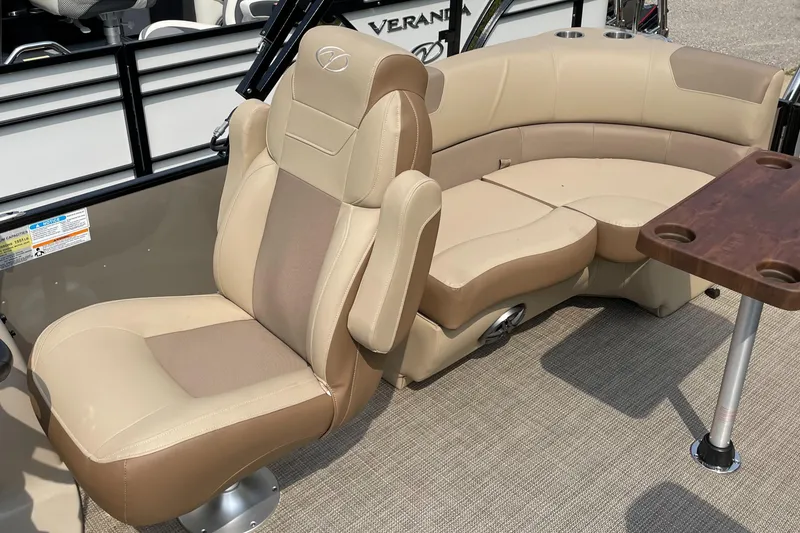 Slide: The Image of 2024 Veranda VR20RC boat interior with beige and tan seating. - 2