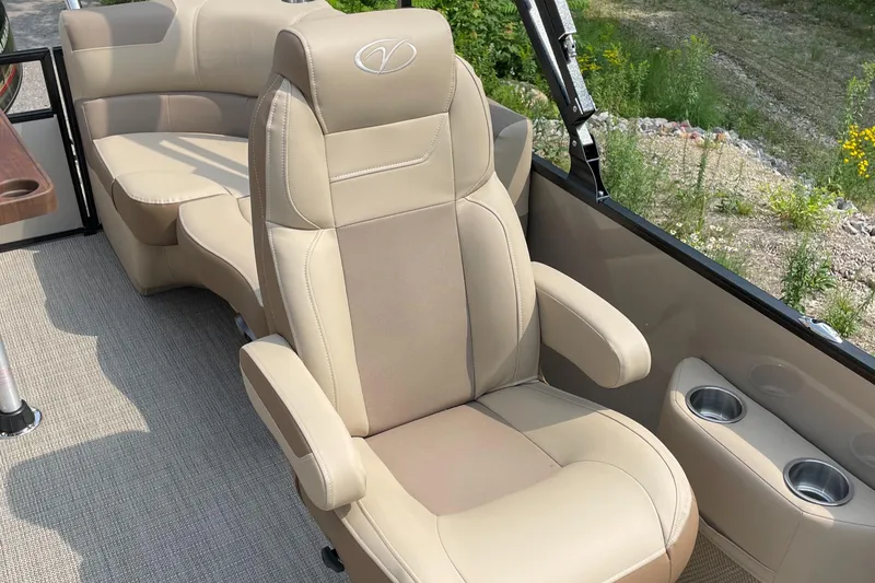 Slide: The Image of 2024 Veranda VR20RC boat interior with beige captain's chair and seating. - 6
