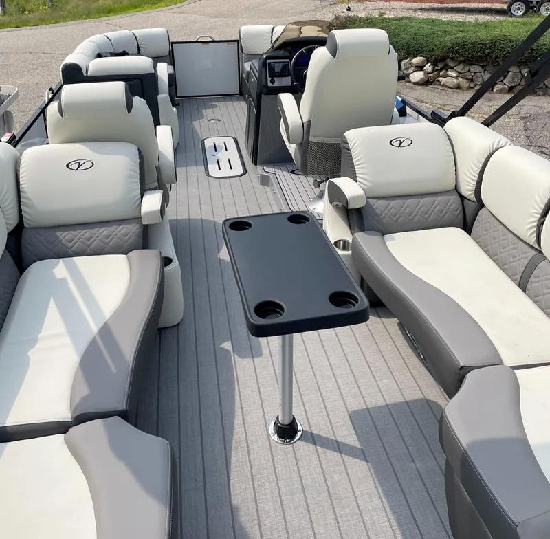 Slide: The Image of 2024 Veranda VP 22RC pontoon boat interior with luxurious seating and table. - 7