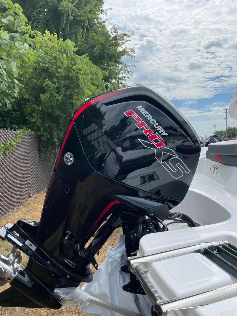 Slide: The Image of 2024 Tahoe T18 boat with Mercury Pro XS outboard motor. - 4