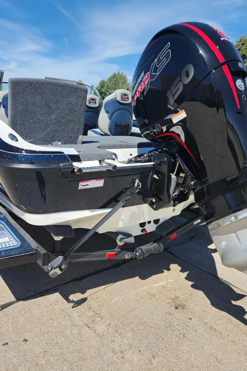 Slide: The Image of 2024 Ranger 1850MS boat with powerful outboard motor. - 2