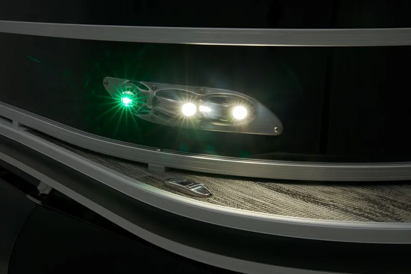 Slide: The Image of 2024 Ranger Reata 223F boat with illuminated navigation lights. - 19