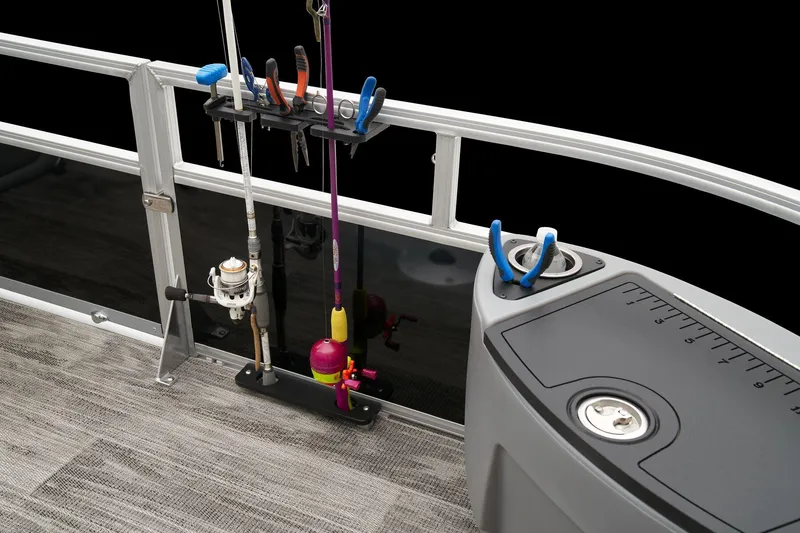Slide: The Image of 2024 Ranger Reata 223F fishing rod holders and tackle storage. - 29