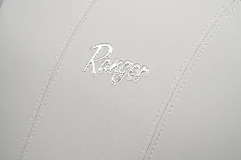 Slide: The Image of Ranger logo on white leather seat of 2024 Ranger Reata 223F. - 44