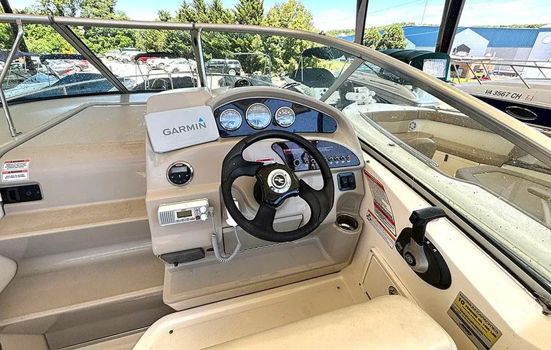 Slide: The Image of 2008 Sea Ray 240 Sundancer boat dashboard with Garmin navigation system. - 9