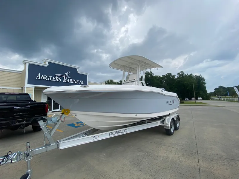 Slide: The Image of 2026 Robalo 202 EXPLORER boat on trailer at Anglers Marine dealership. - 1