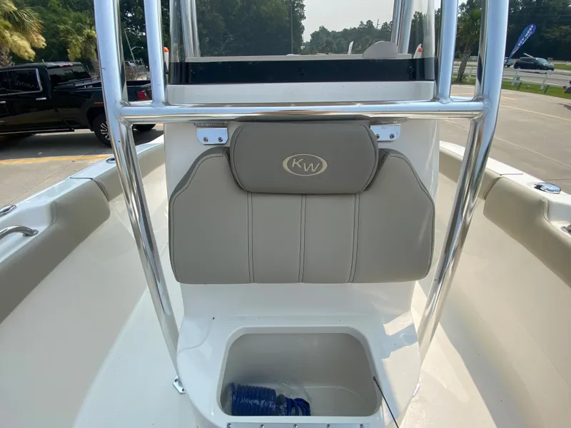 Slide: The Image of 2026 Key West 203 FS boat interior with seating and storage compartment. - 20