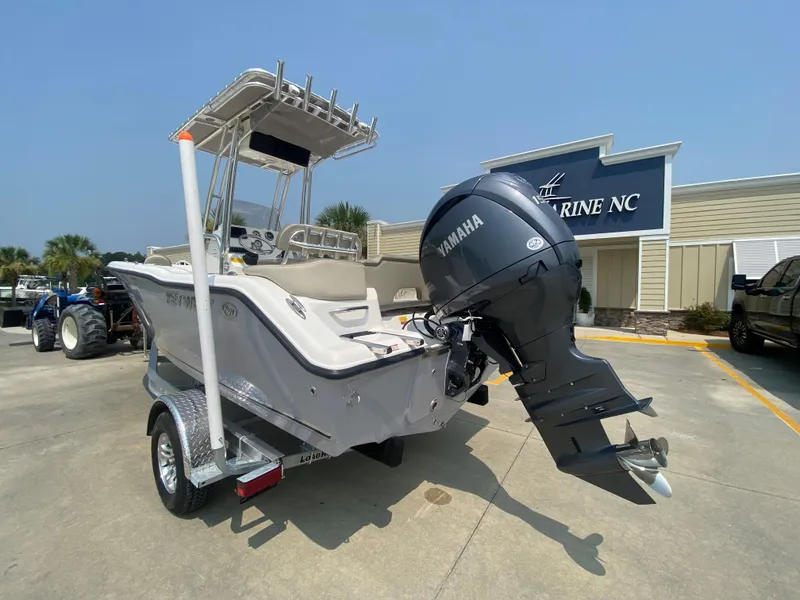 Slide: The Image of 2026 Key West 203 FS boat with Yamaha engine on trailer, parked outside Marine NC. - 5