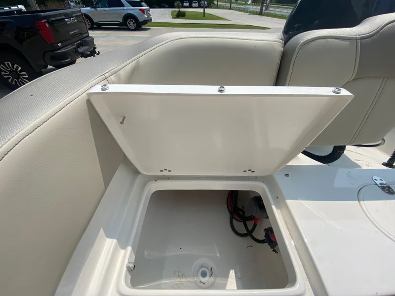 Slide: The Image of Open storage compartment on 2026 Key West 203 FS boat, showing interior details. - 8