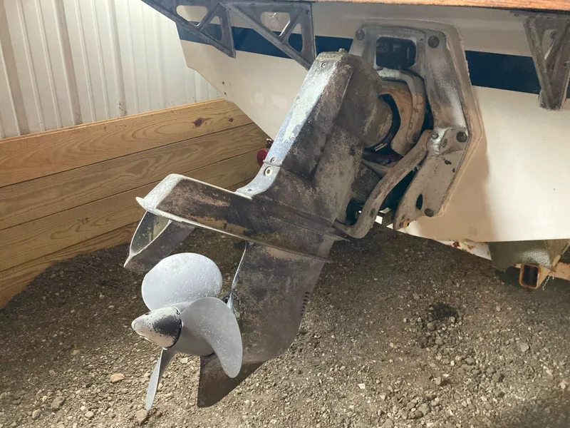 Slide: The Image of 1970 Chris-Craft Lancer 23 boat propeller and stern drive in storage. - 22