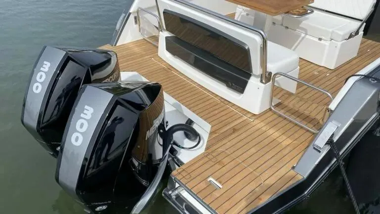 Slide: The Image of Schaefer V33 2025 boat with twin 300 horsepower Mercury outboard engines. - 3