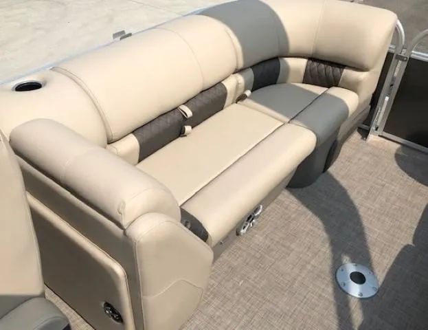 Slide: The Image of 2023 Sun Tracker Party Barge 22 DLX interior seating with beige upholstery. - 20