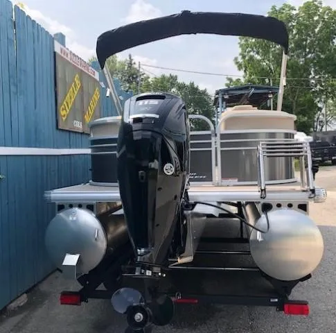 Slide: The Image of 2023 Sun Tracker Party Barge 22 DLX pontoon boat with outboard motor. - 4