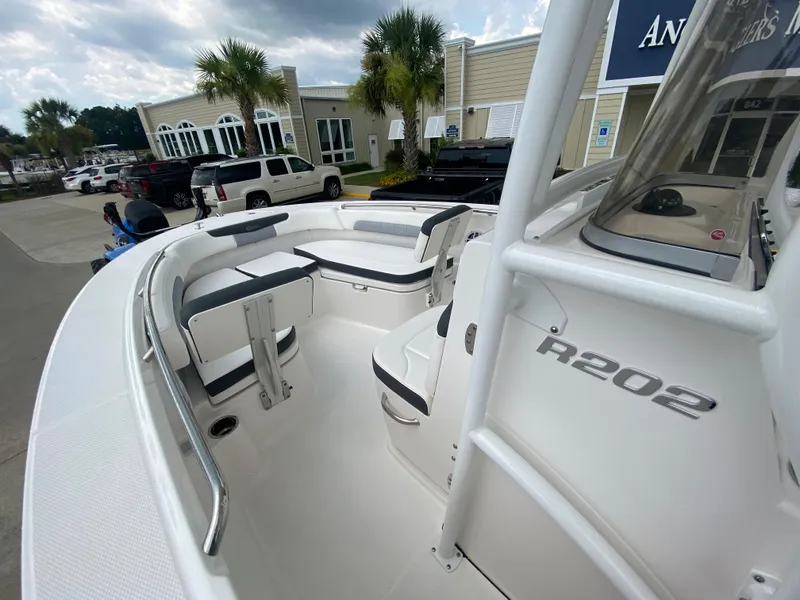 Slide: The Image of 2024 Robalo 202 EXPLORER boat interior with seating and console. - 20