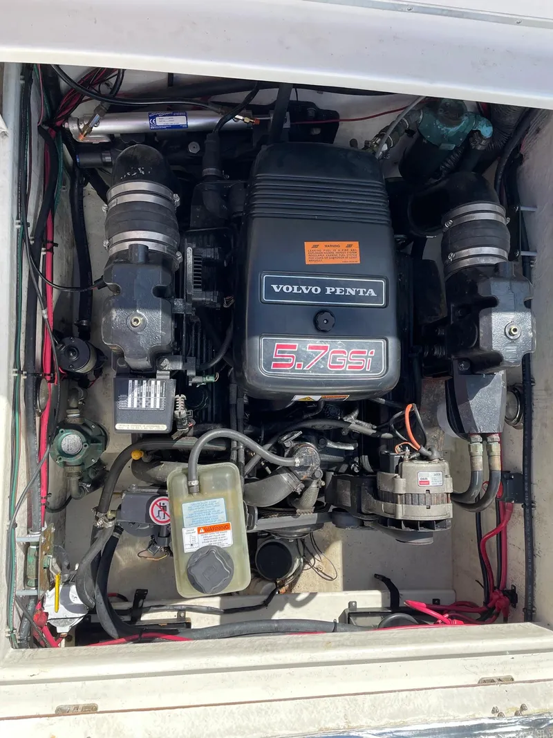 Slide: The Image of 2004 SeaSport 2400 XL boat engine compartment with Volvo Penta 5.7 GSi engine. - 5